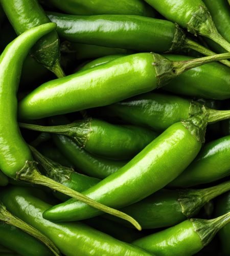 close up fresh green chili peppers